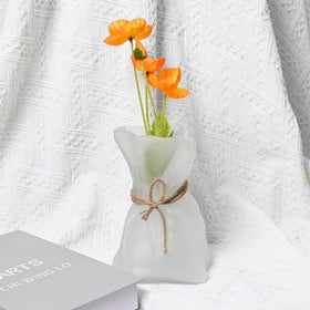 Kaitnax vase narrow mouth ideal for a single stem centerpiece.