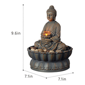 Kalona Buddha fountain with reflective lighting enhances mood.