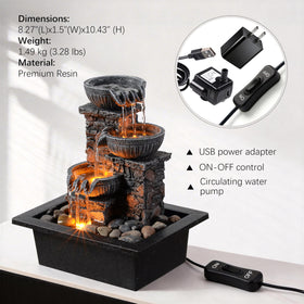 Kalona tabletop fountain in castle-rock design enhances natural ambience.