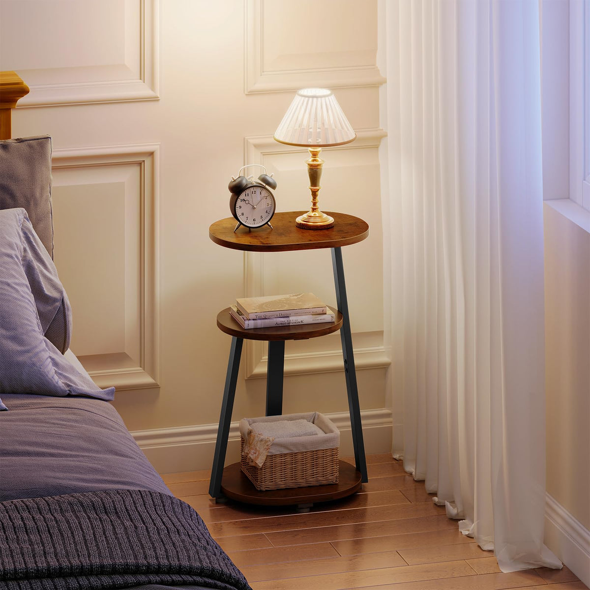 Kalrin oval side table ideal as a bedside nightstand in small rooms.