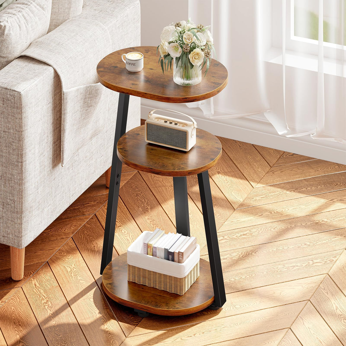 Kalrin oval side table with wide top for laptop and books.