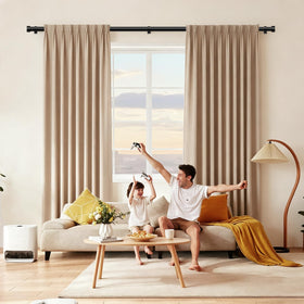 KAMANINA curtain rods 2-pack mounted in living room with matte black finish