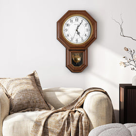 KANEODOT wall clock with pendulum ideal for kitchen or dining spaces.