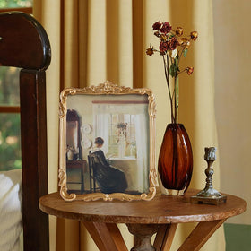 Kangce Victorian-detail frame close-up highlighting ornate resin carving and refined craftsmanship.