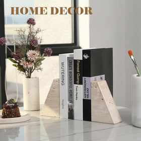 Karibiber travertine bookends keep shelves neat in a home office