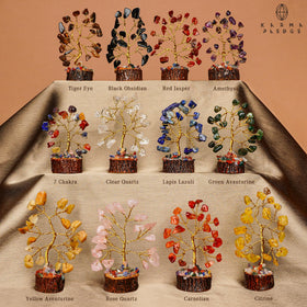 KARMAPLEDGE 7-chakra crystal tree close-up highlighting grounding balance