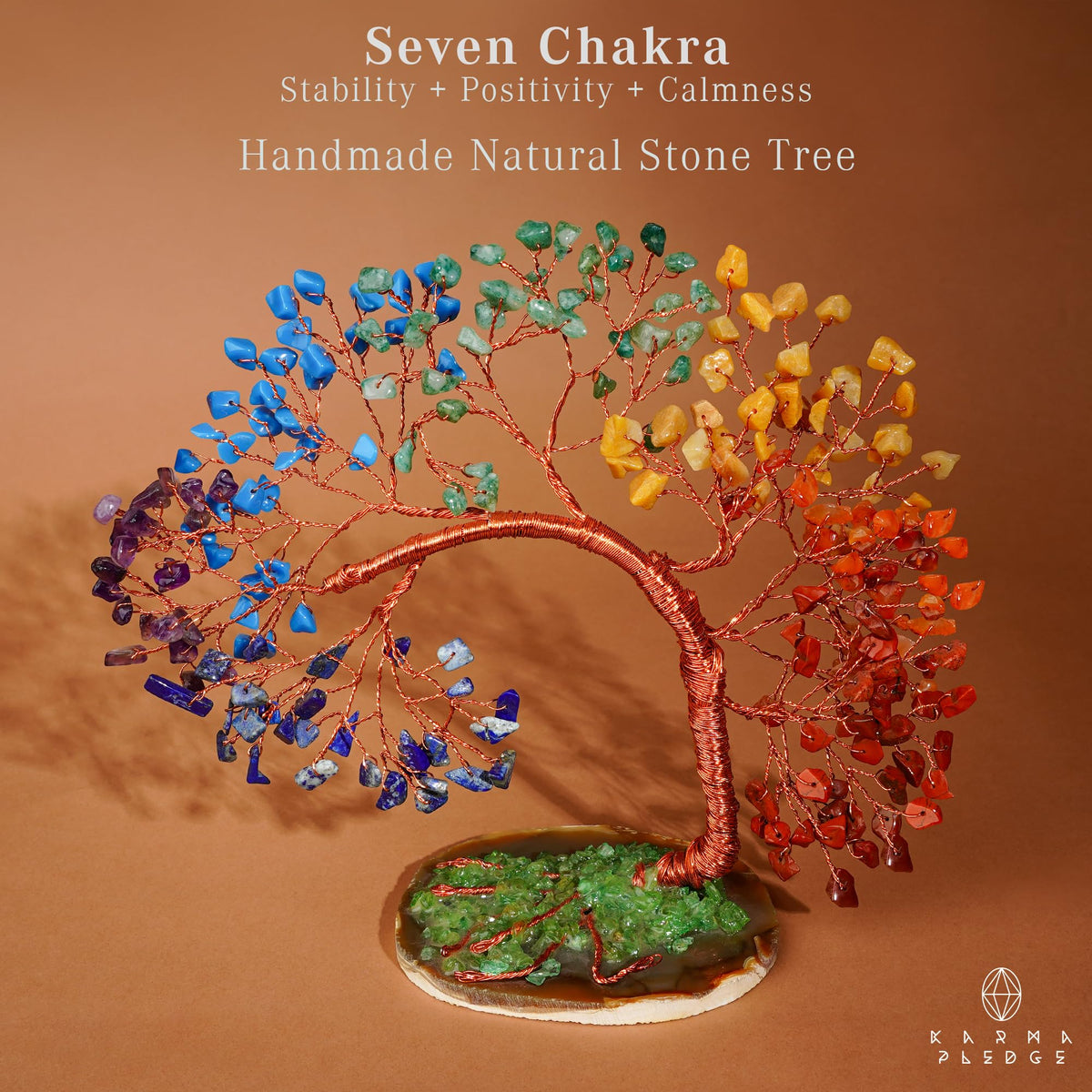 KARMAPLEDGE crystal tree with copper wire branches highlights craftsmanship and design.
