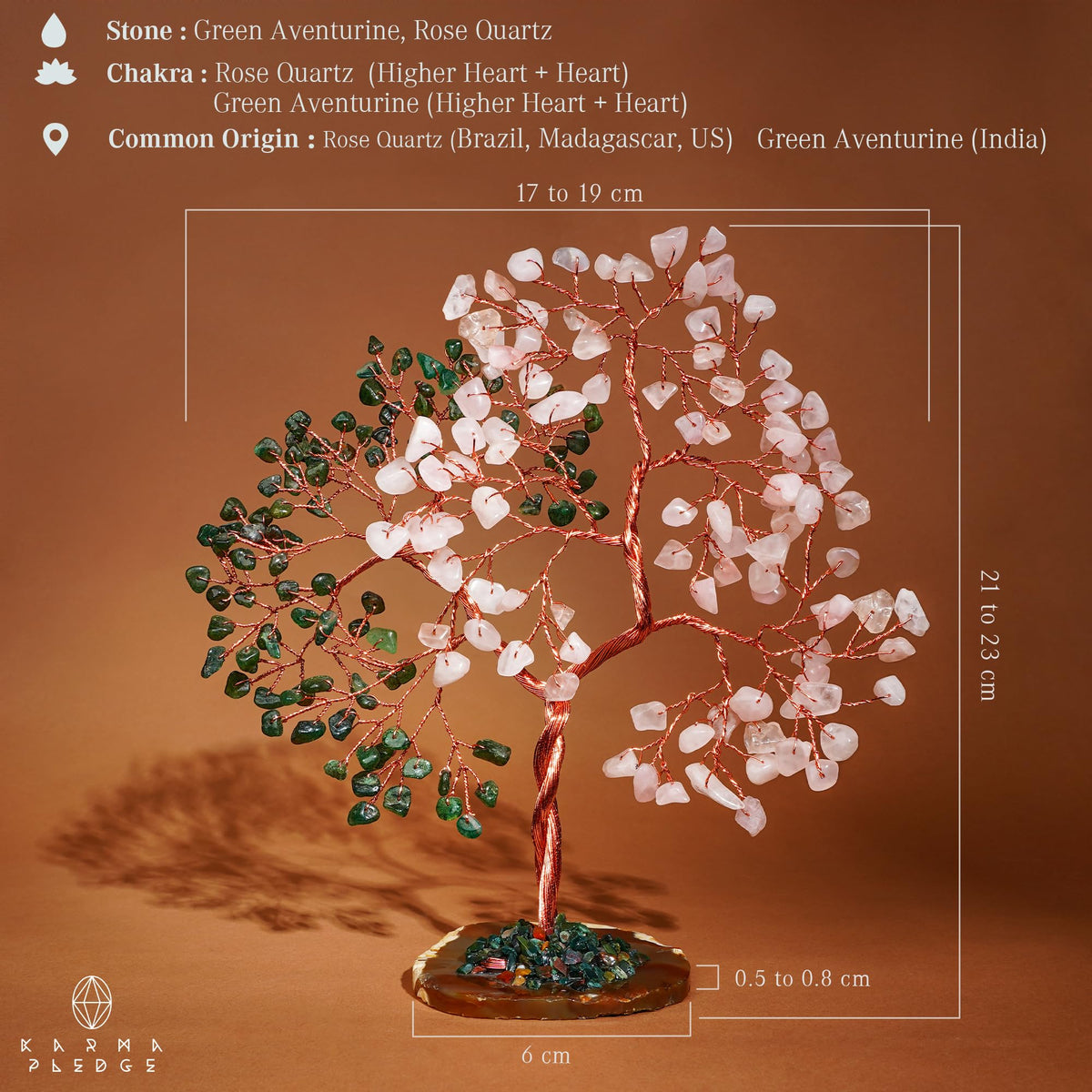 KARMAPLEDGE crystal tree base resting on natural crystal slice for elegant décor