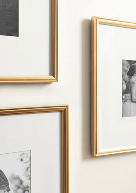 Pre-installed D-ring hangers enable easy wall mounting.