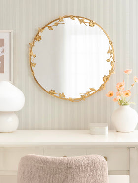 Rosella round ornate edge highlights elegant symmetry as a statement wall piece.