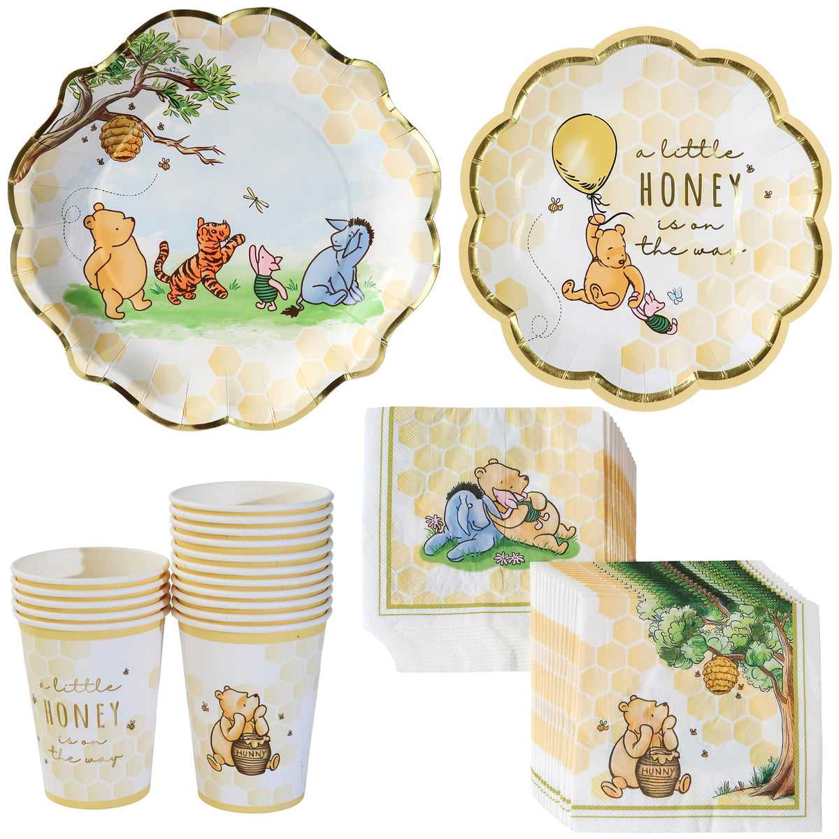 Kate Aspen Honey Bear Winnie dinner plates with gold foil accents for an elegant baby shower.