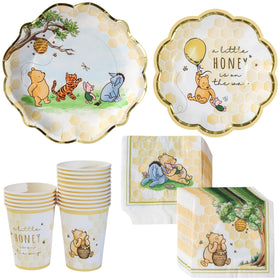 Kate Aspen Honey Bear Winnie dinner plates with gold foil accents for an elegant baby shower.