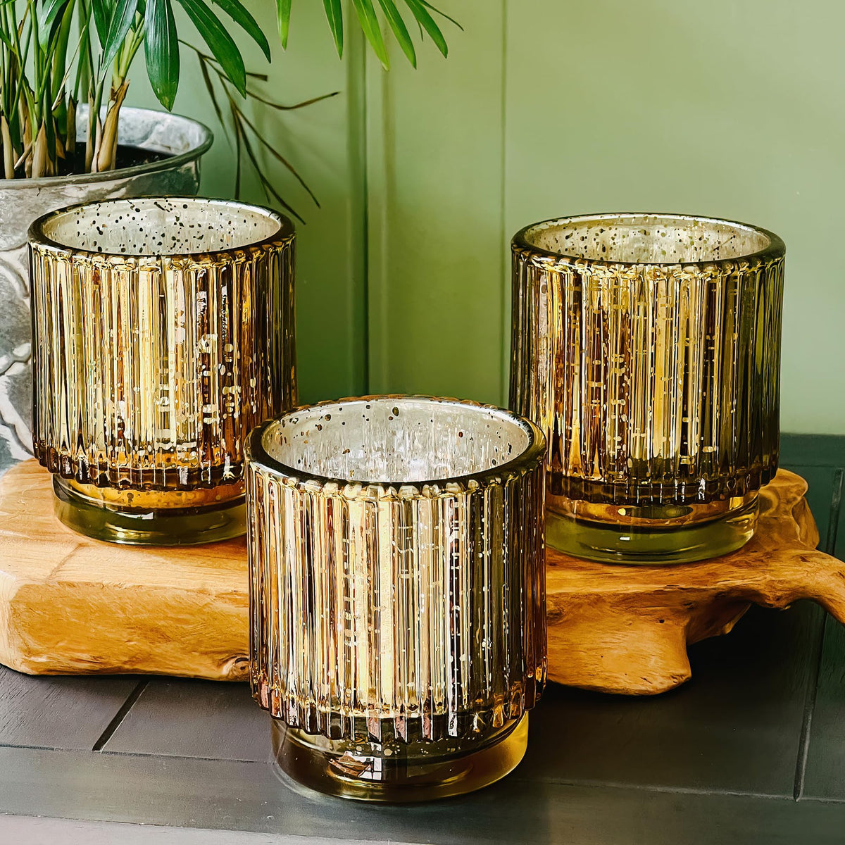 Kate Aspen ribbed votives grouped on a tray for wedding decor.