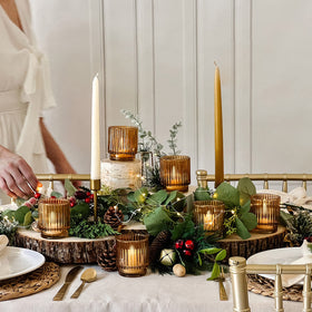 Kate Aspen vintage boho dining centerpiece using amber holders