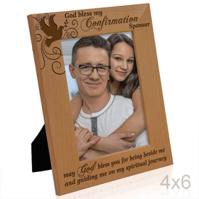 Kate Posh holds 4x6 photo in portrait orientation for memories