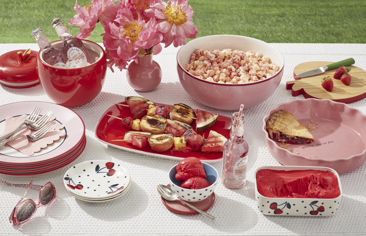 kate spade new york pink Make It Pop small vase on dining table adds cheerful accent