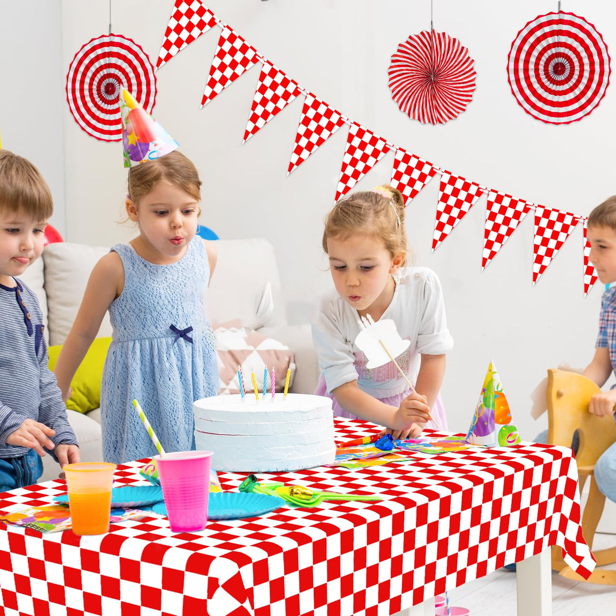 KaTiSeMo backyard setup showcases cohesive red gingham decor for summertime gatherings.