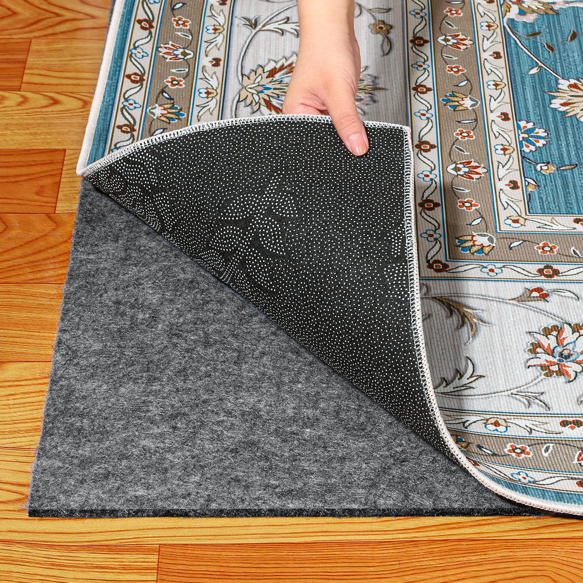 Kautudrum waterproof rug pad with felt top keeps rugs in place.