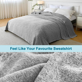KAWAHOME Double-sided sweatshirt blanket close-up shows soft fleece-like warmth.