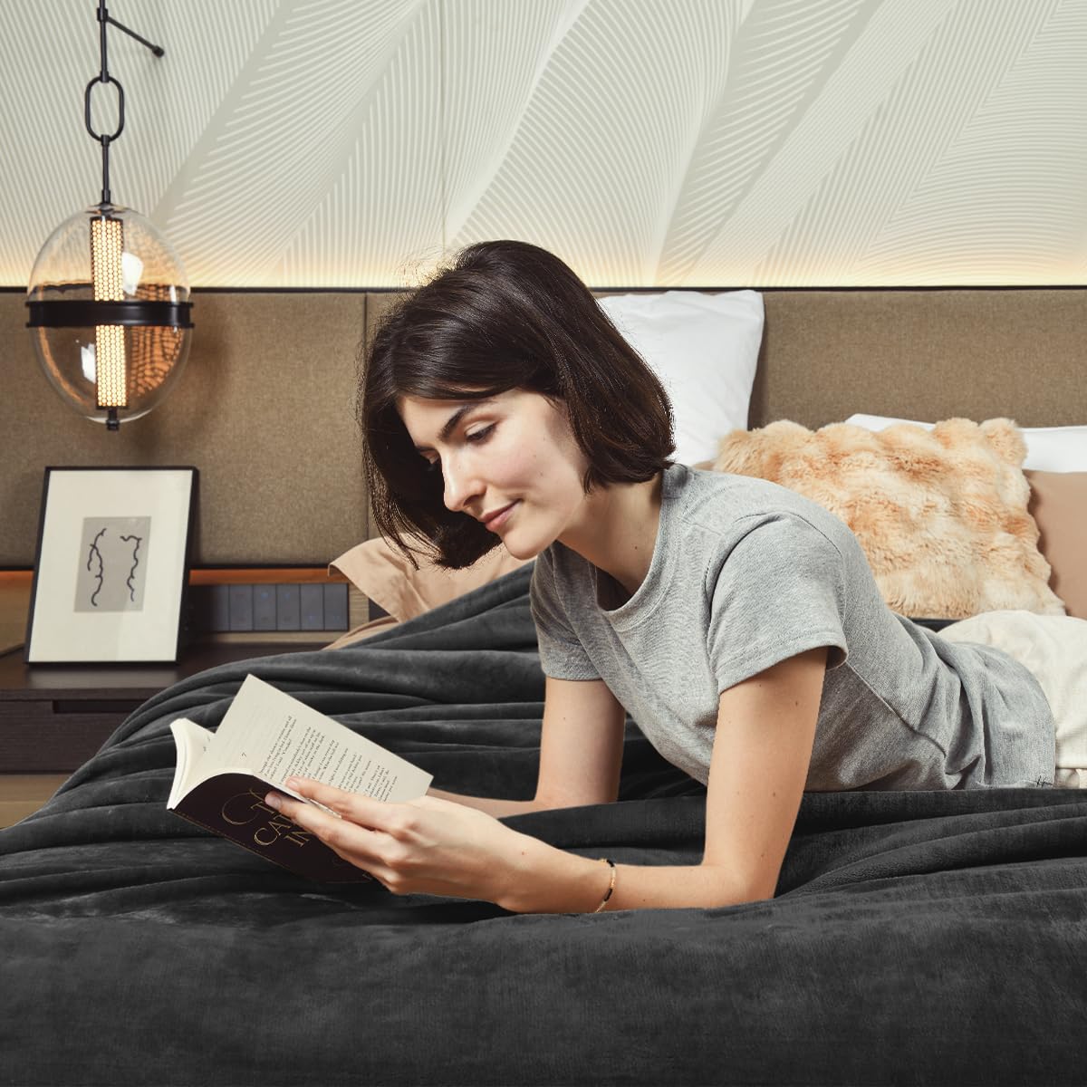 KAWAHOME Sherpa blanket care shot with machine-washable fabric details.