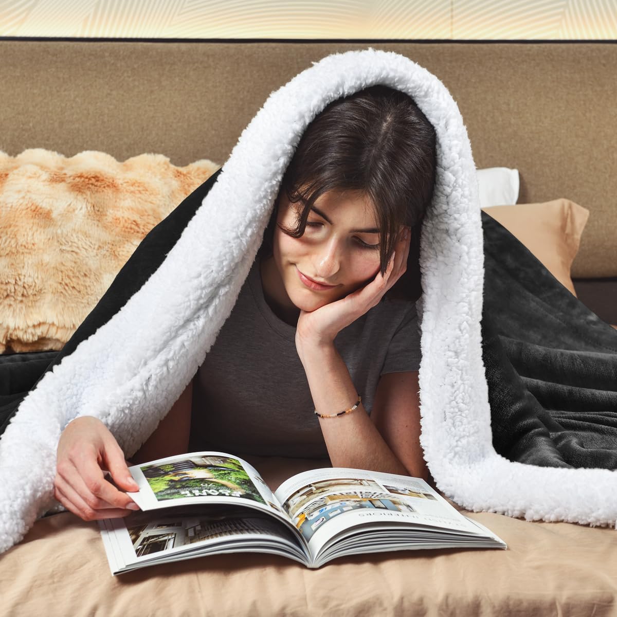 KAWAHOME Sherpa blanket folded for couch, showcasing cozy texture.