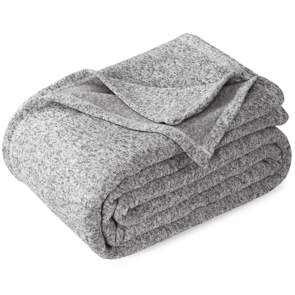KAWAHOME Summer Sweatshirt Blanket on bed delivers breathable comfort for warm nights.