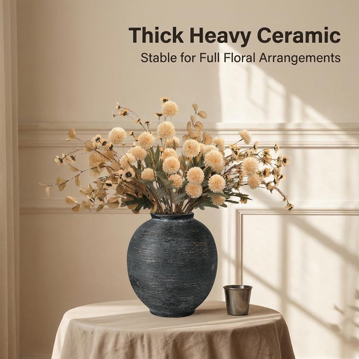 Kayolin vase on dining table as a centerpiece.