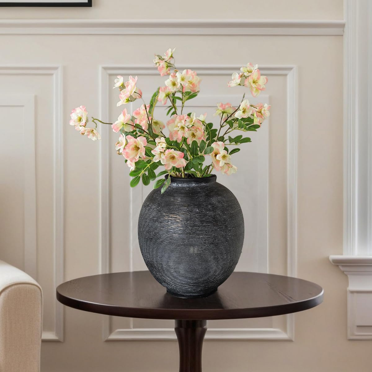 Kayolin vase on mantel display with accents.
