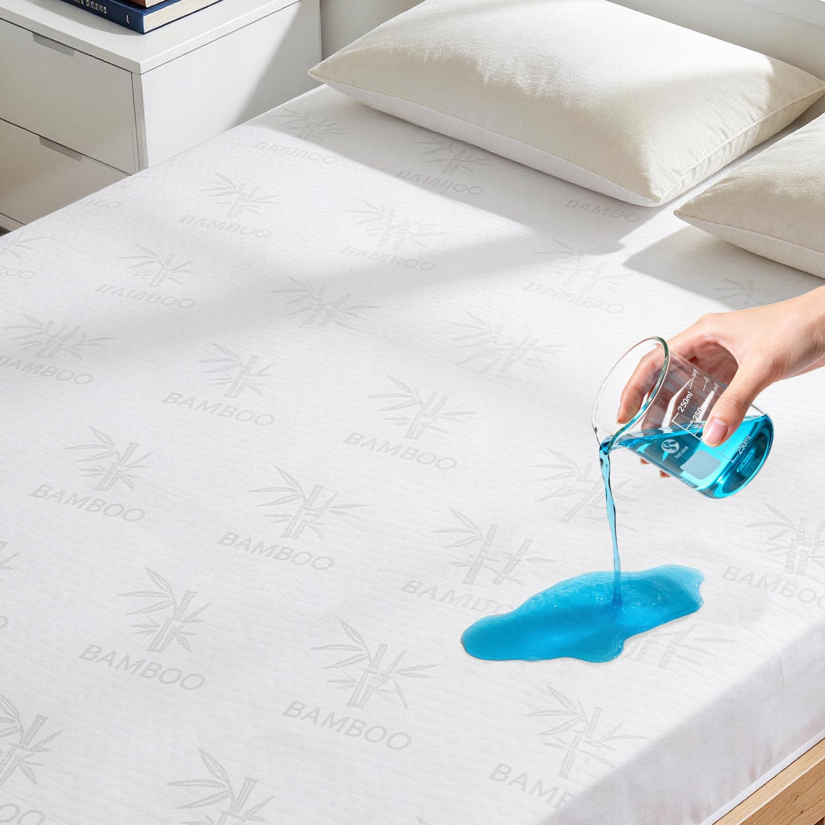 Kaywazy waterproof mattress protector on king bed with deep-pocket fit protecting against spills.