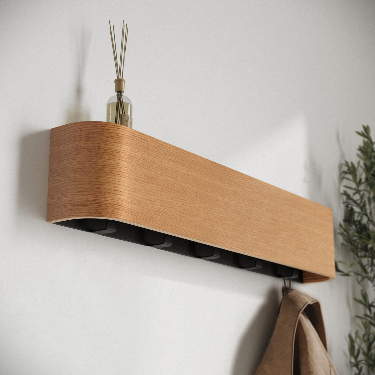 Kazai Toke German-designed coat rack elevates contemporary entryways.