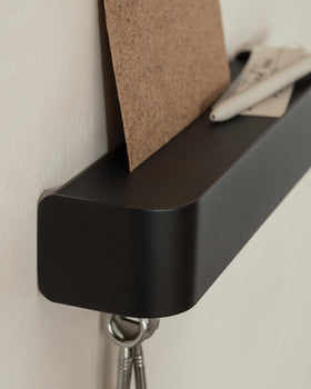 Kazai Tone metal shelf detail highlights a durable powder-coated finish.