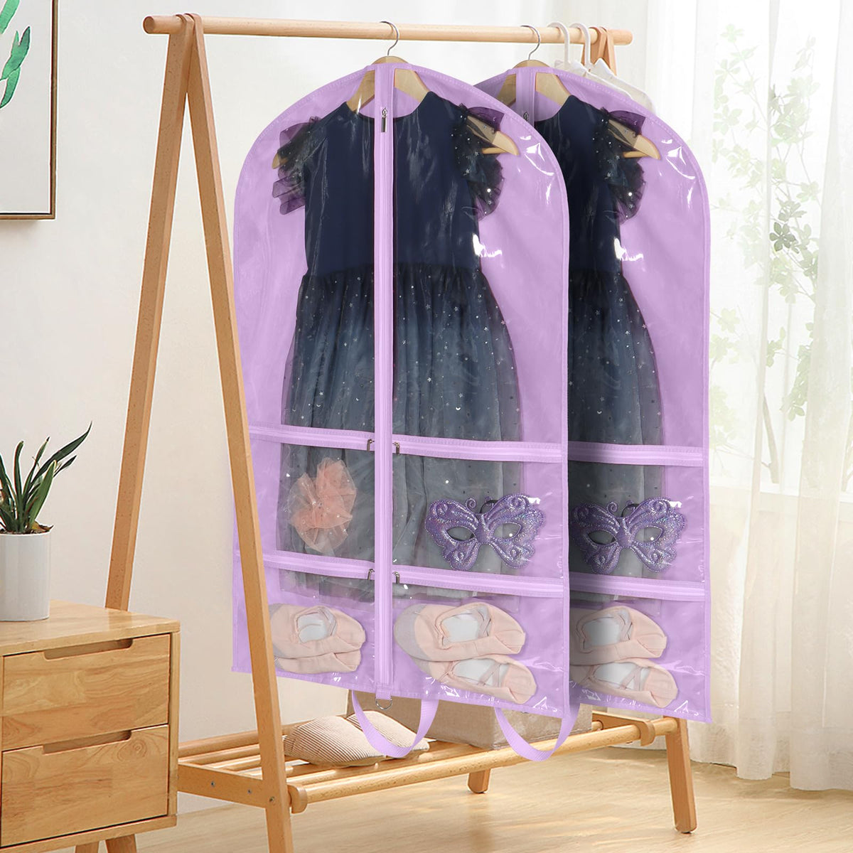 KEEG bag doubles as closet storage for coats and dresses when not used for costumes