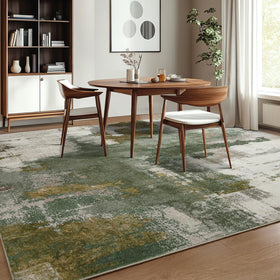 Kelarea bedroom and dining space rug with neutral vintage greens.