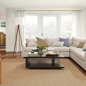 Kemmie curtain rods with telescoping sections illustrate easy length adjustment for different window sizes.