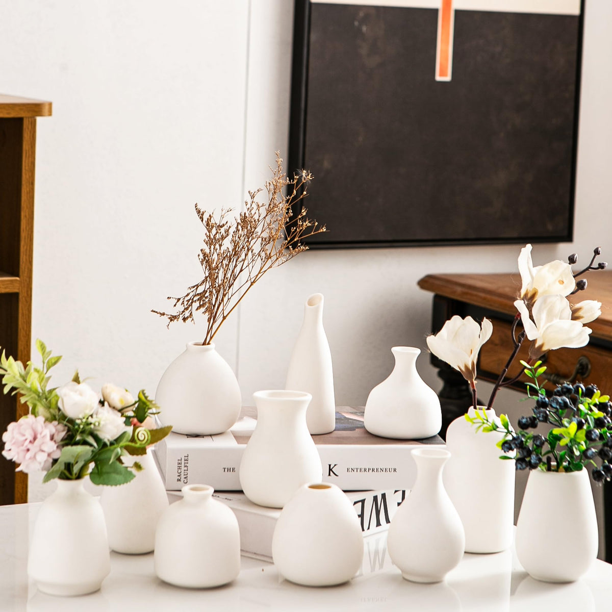 Kendiis 11-pack ceramic bud vases with assorted shapes for unique centerpieces.