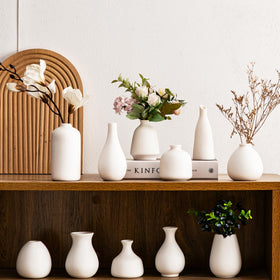 Kendiis mini vases with matte white finish suitable for DIY projects.