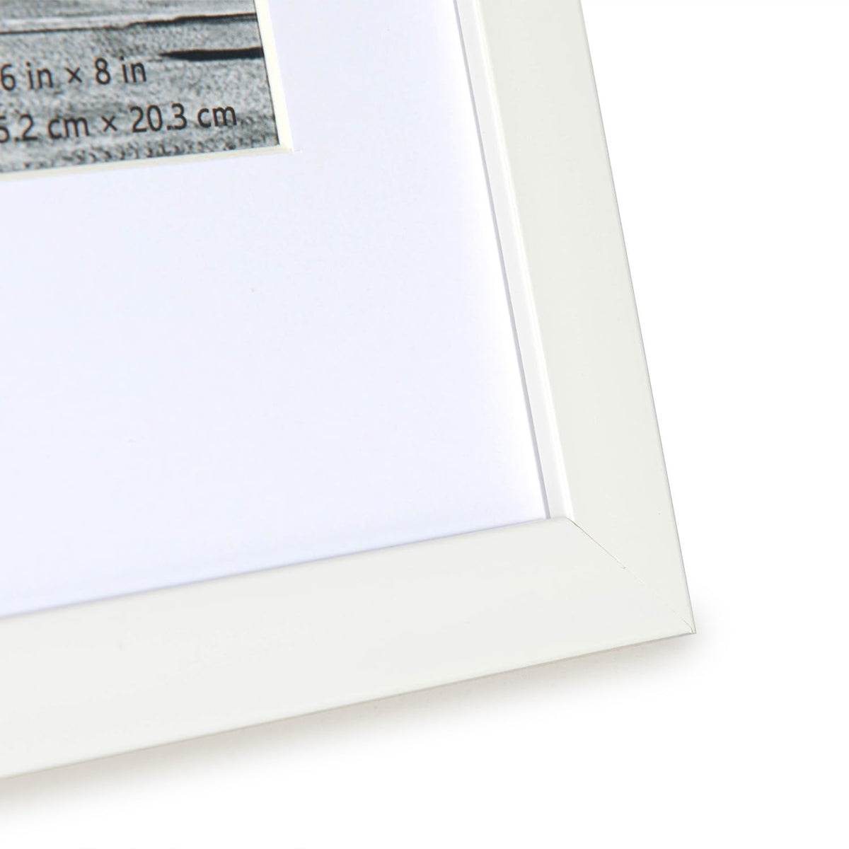 kennethan wall-hung frame vertical orientation with metal tabs for easy viewing.