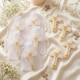 Kenning gold rosary chains accompany each candle for elegant ceremony keepsakes