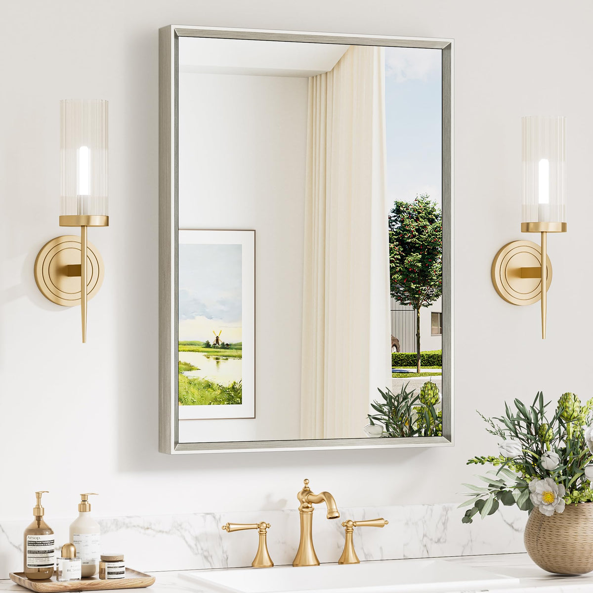 Keonjinn over-sink bathroom mirror with beveled frame enhances vanity lighting.