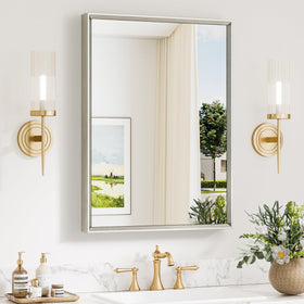 Keonjinn over-sink bathroom mirror with beveled frame enhances vanity lighting.