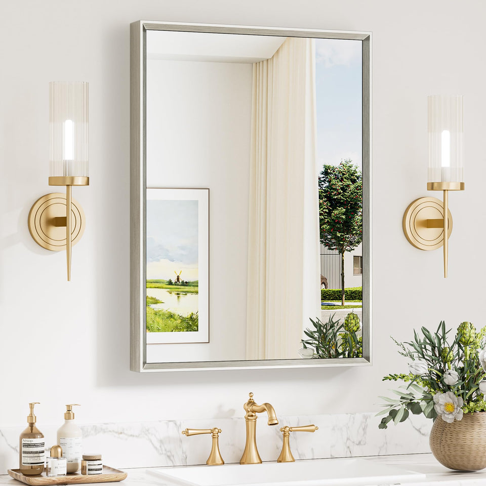 Keonjinn over-sink bathroom mirror with beveled frame enhances vanity lighting.