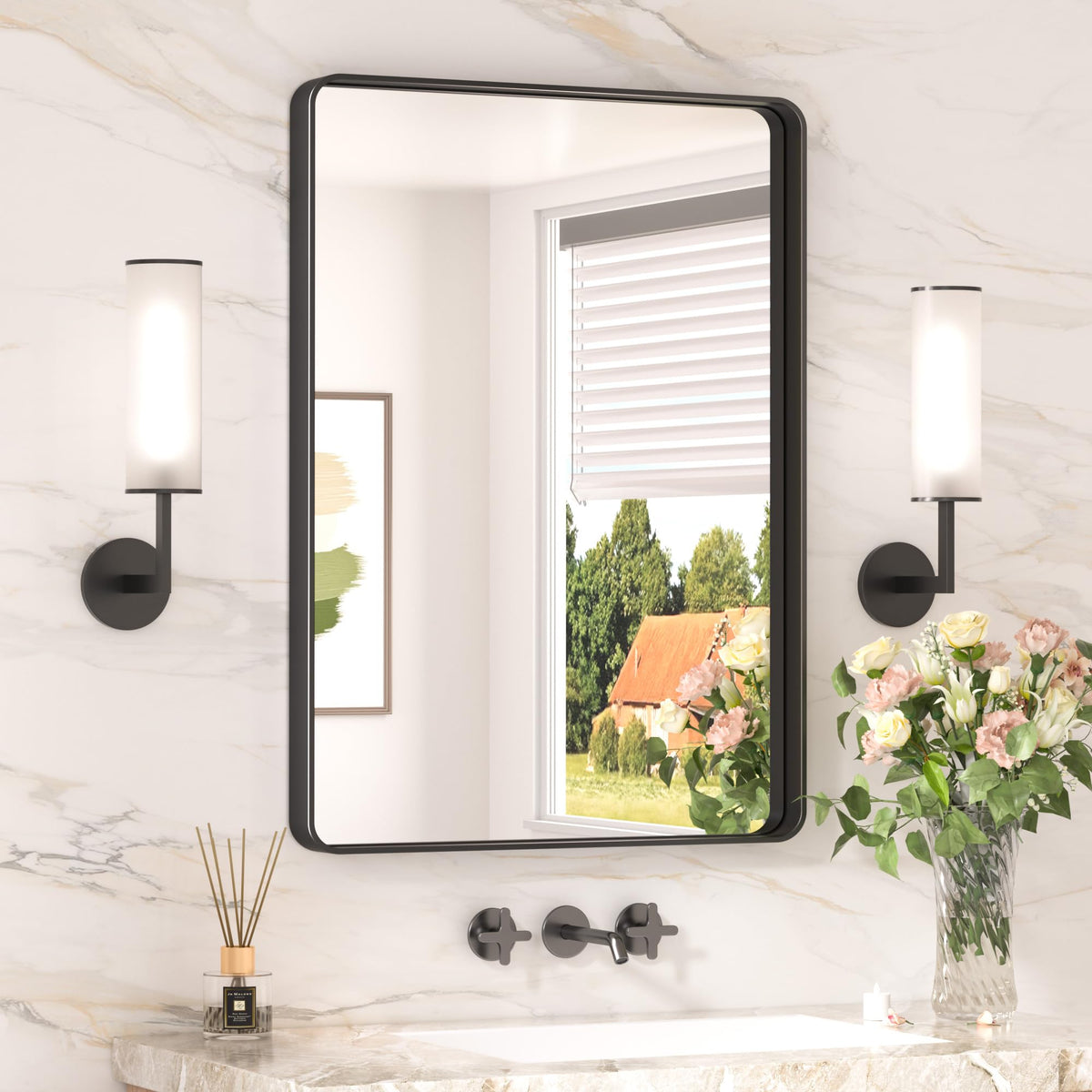 Keonjinn black bathroom mirror with rounded rectangle silhouette enhances a modern sink area