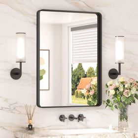 Keonjinn black bathroom mirror with rounded rectangle silhouette enhances a modern sink area