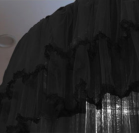 Kertnic pink canopy draped over a baby cradle for decor and privacy.