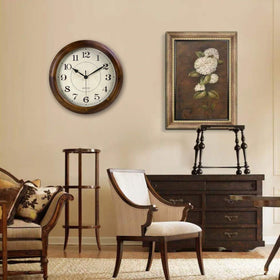 Kesin wall clock wood 14inch back hanging slot simplifies mounting.