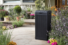 Keter Baltimore 34.4 inch tall black trash can on patio