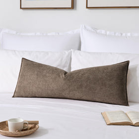 Kevin Textile lumbar cover in coco brown with waterproof surface for easy spill cleanup.