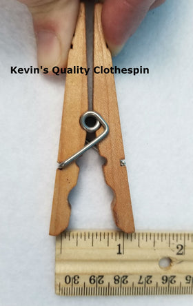 Kevin's Quality Clothespins on clothesline demonstrating secure hold in breezy weather