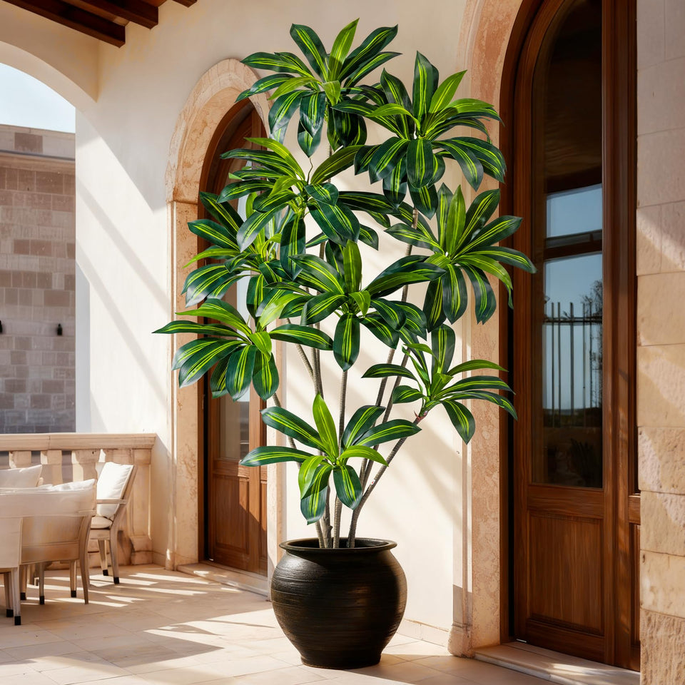 Kgabbke tall faux Dracaena tree enhances floor space in living rooms.