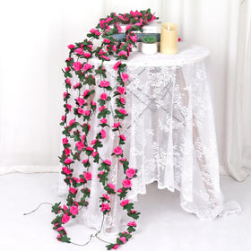 KHOYIME table decor featuring rose garland for festive setup